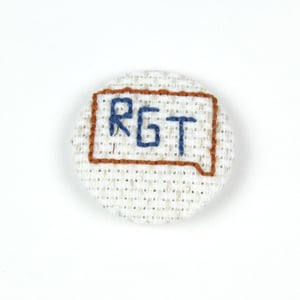 Image of Rock Garden Tour Cross-Stitched Button