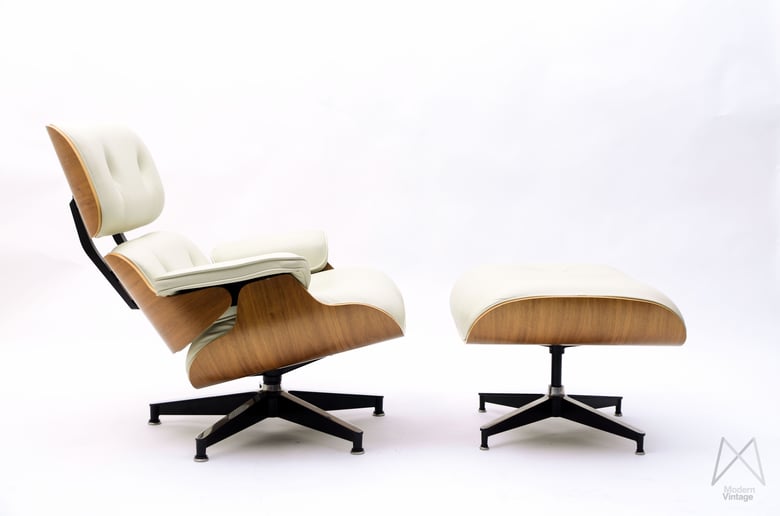 Image of Eames Lounge Chair Ottoman Walnut veneer Off white tan leather Original Herman Miller Europe