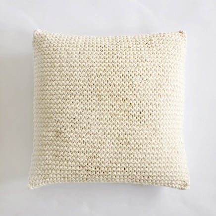 Image of cream knit cushion cover