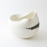 Image 1 of altered porcelain vessel