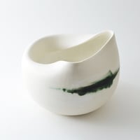 Image 4 of altered porcelain vessel
