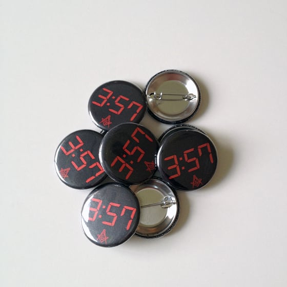 Image of 3:57 button