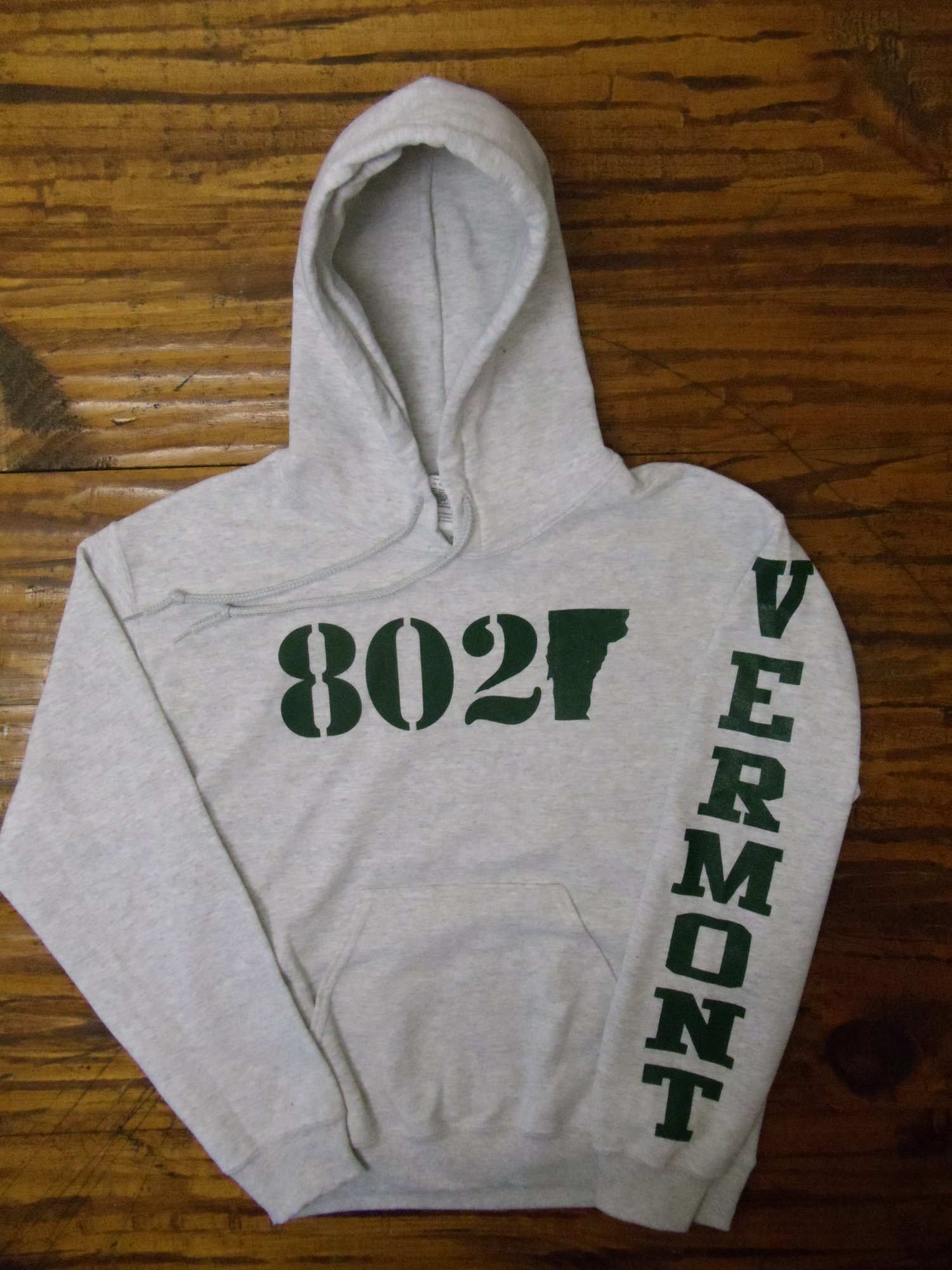 Image of 802 Classic Hooded Sweatshirt - Forest Green 802 logo on a Ash Grey with Vermont Sleeve