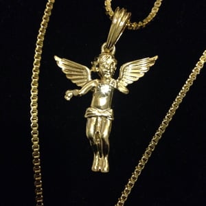 Image of angel/Jesus piece with stones