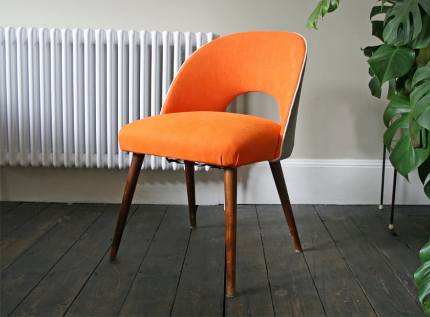 Image of 1950's occasional chair in orange