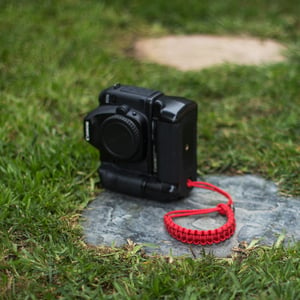 Image of Red adjustable camera wrist strap