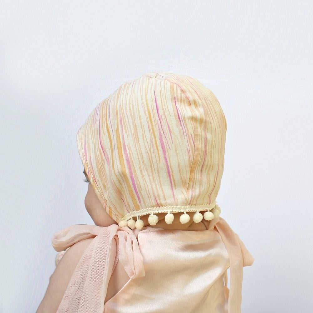 Image of Watercolor Garden Bonnet in Apricot/Mauve