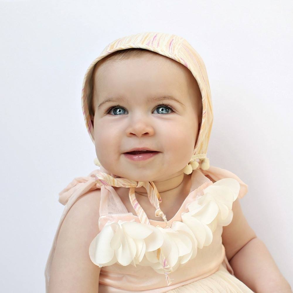 Image of Watercolor Garden Bonnet in Apricot/Mauve