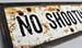 Image of No Shooting Sign - Metal with Reclaimed Wood Frame