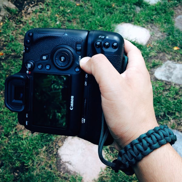 Image of Hunter green adjustable camera wrist strap
