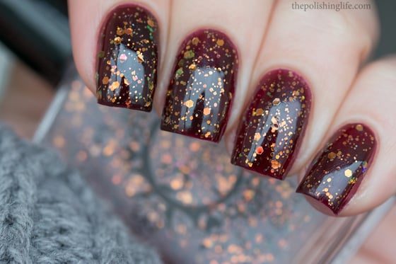 Image of ~Light as a Feather~ opalescent orange glitter nail polish topcoat!