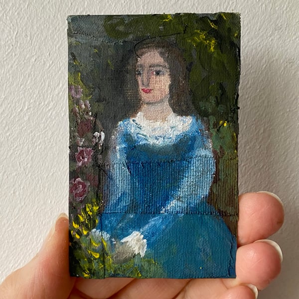 Image of a gardener in blue