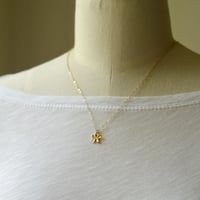 Image 2 of Tiny gold plumeria necklace