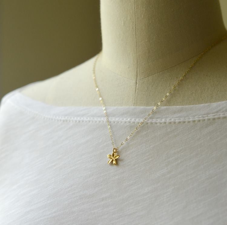 Image of Tiny gold plumeria necklace