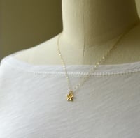 Image 4 of Tiny gold plumeria necklace