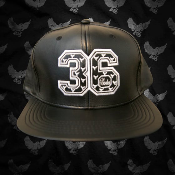 Image of Black/White 36 Leather Snapback