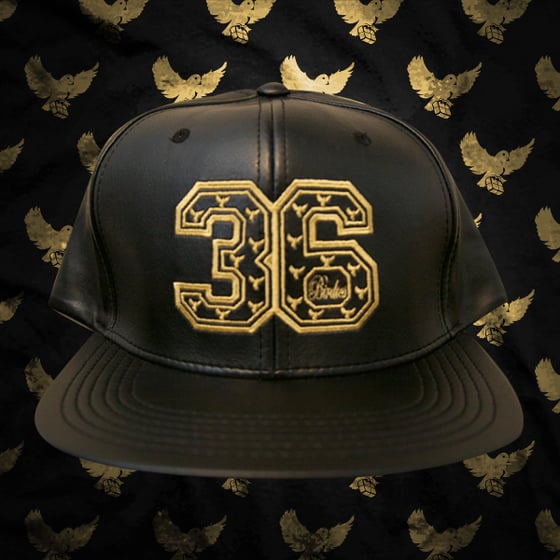 Image of Black/Gold Leather 36 Snapback