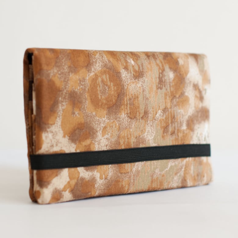 Image of PORTAFOGLIO donna in stoffa animalier