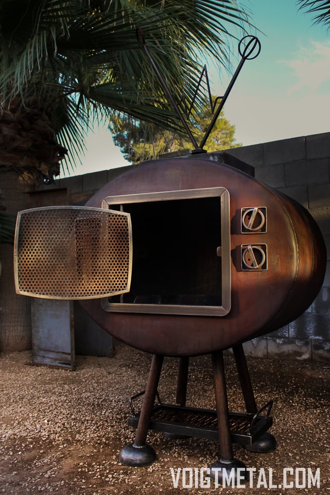 Image of "Nothings ever on" Voigt Metal T.V.-Outdoor wood burning fireplace