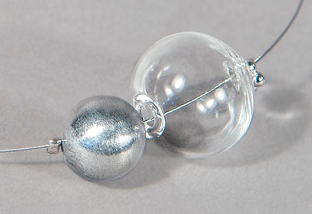 Image of collana MINIMALIA in perle soffiate di vetro trasparente di Murano