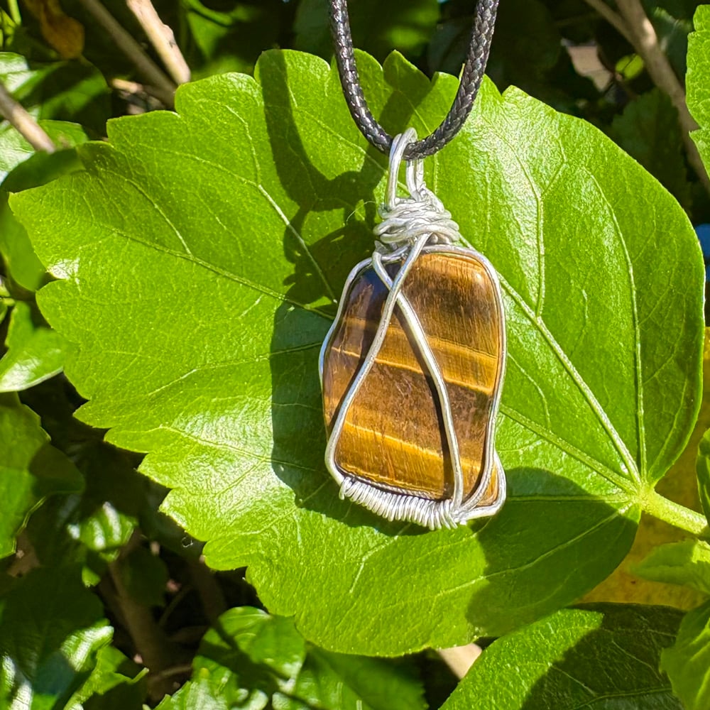 Image of tiger’s eye pendant c