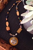 Image of Antique African amber pendant with silver and copper set