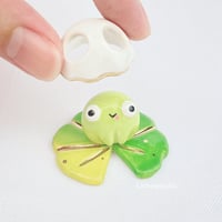 Image 4 of Silly Frog on lily pad with ghost mask ceramic figurine