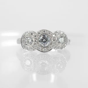 Image of Three stone diamond cluster engagement ring