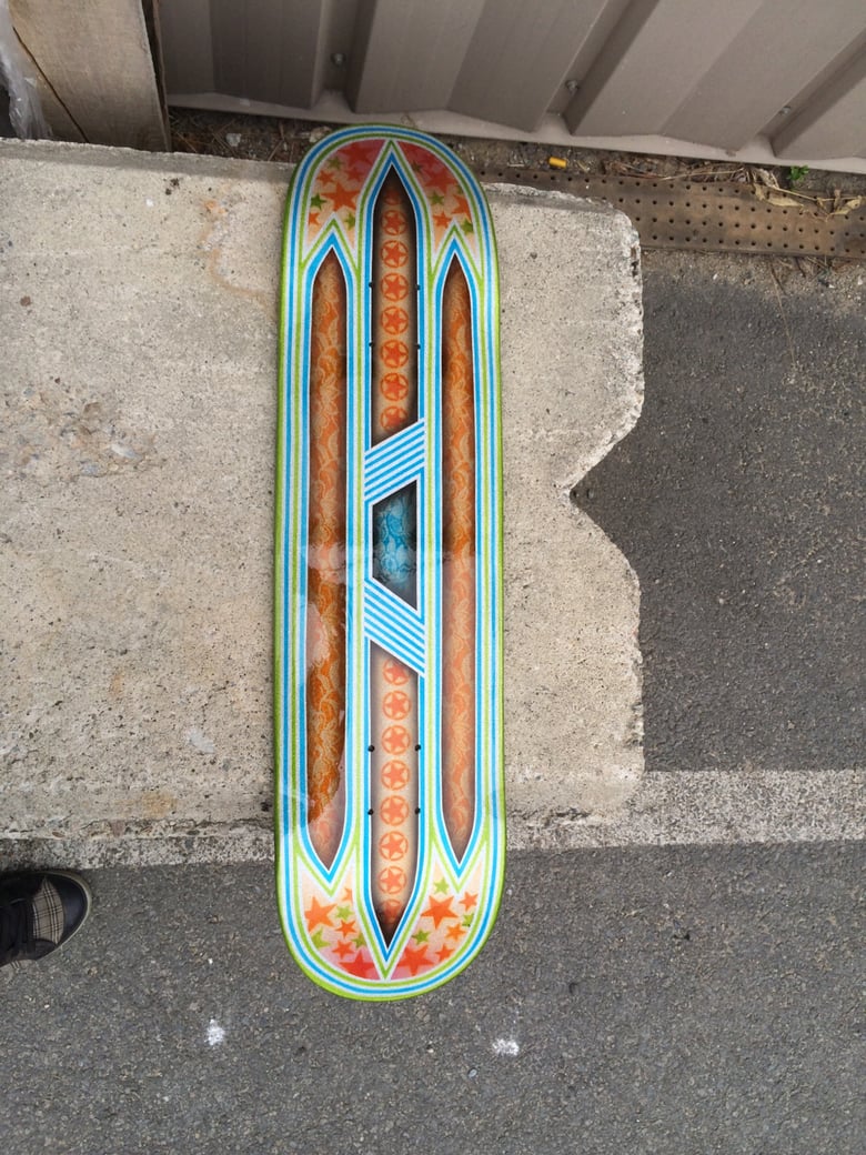 Image of Orange skateboard deck