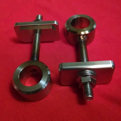 Image of Stainless steel FXR axle adjusters and swingarm end caps