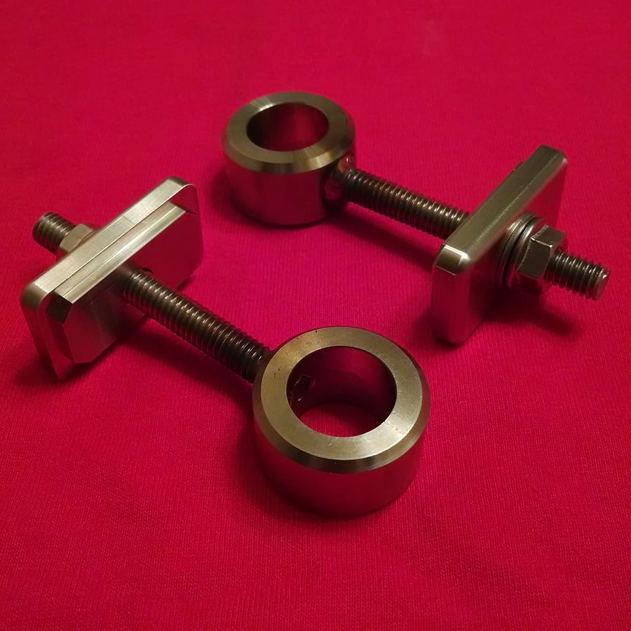 Image of Stainless steel FXR axle adjusters and swingarm end caps