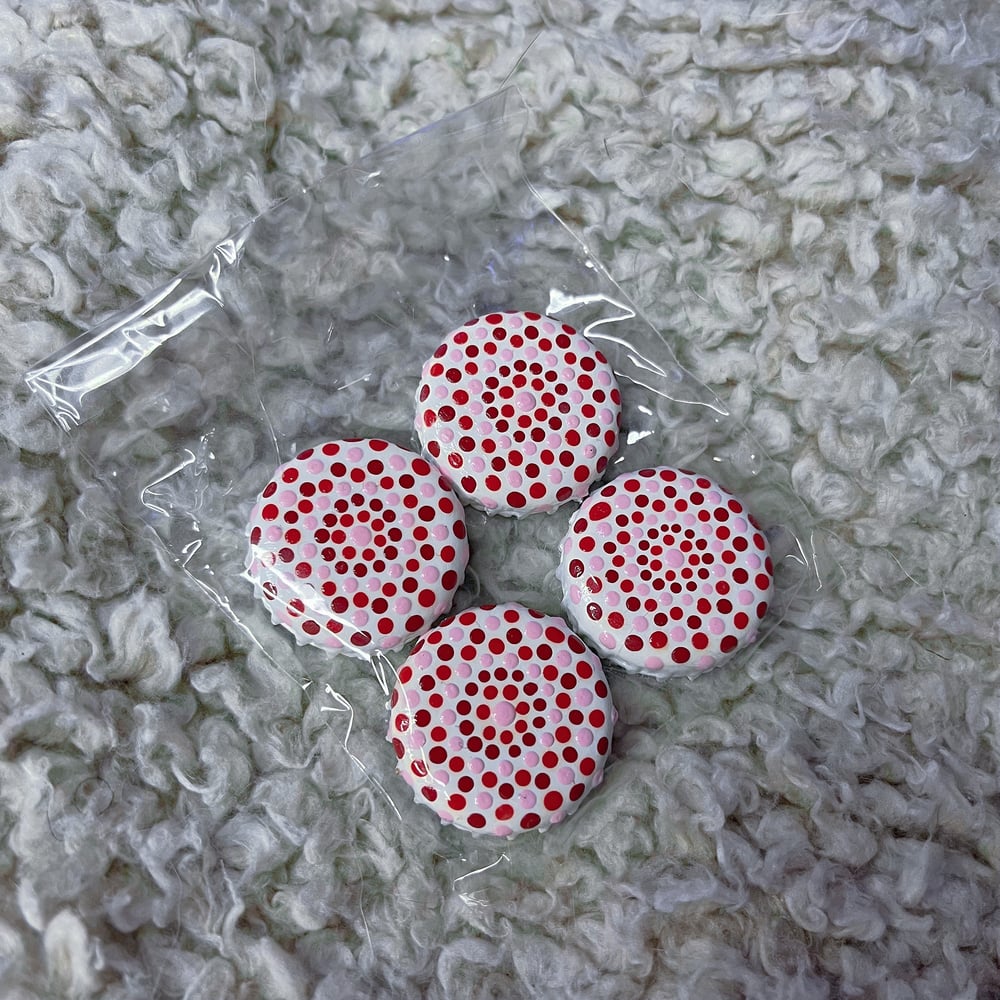 Image of repurposed bottlecap magnets