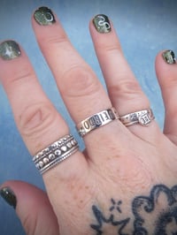 Image 4 of WEIRDO silver ring with star and moon stamp (capitals). Hand stamped silver 925 ring