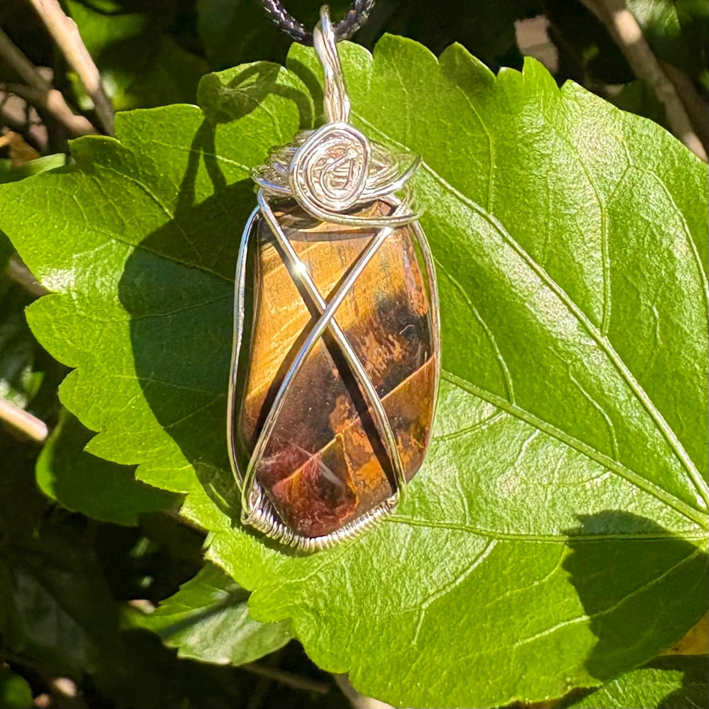 Image of tiger’s eye pendant a