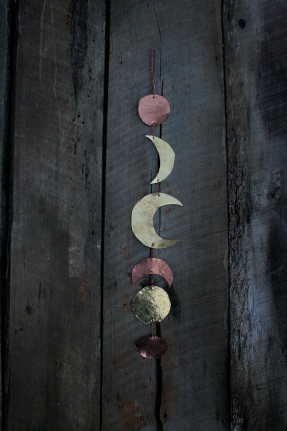 Image of metal moonphase wall hanging 