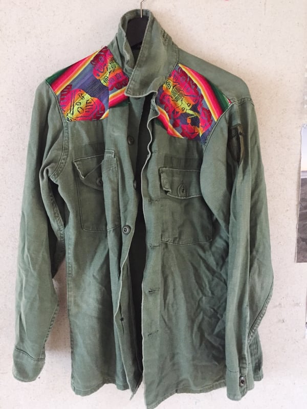 Image of Army jacket with shoulder detail