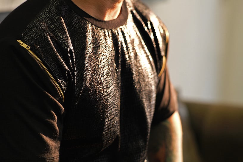 Image of black scale tee