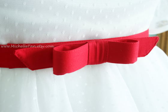 Image of red bow belt