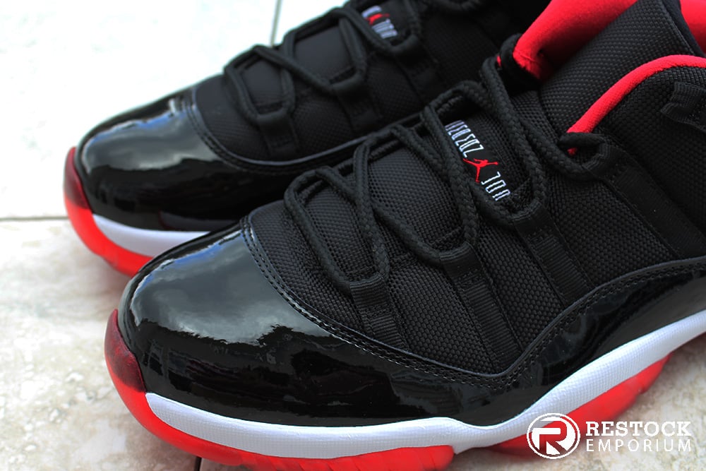 Image of AIR JORDAN 11 RETRO "BRED" LOW