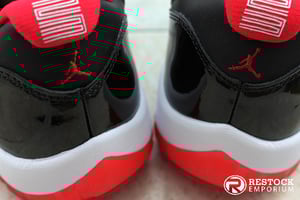 Image of AIR JORDAN 11 RETRO "BRED" LOW