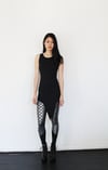 Pointy tunic with faux leather side straps 
