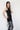 Pointy tunic with faux leather side straps 