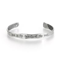 Image 1 of sterling silver love quote cuff  with engraved feather 