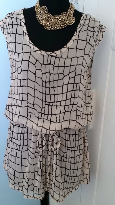 Image of Sheer Nude w/ graphic lines tunic top