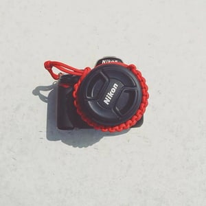 Image of Red adjustable camera wrist strap