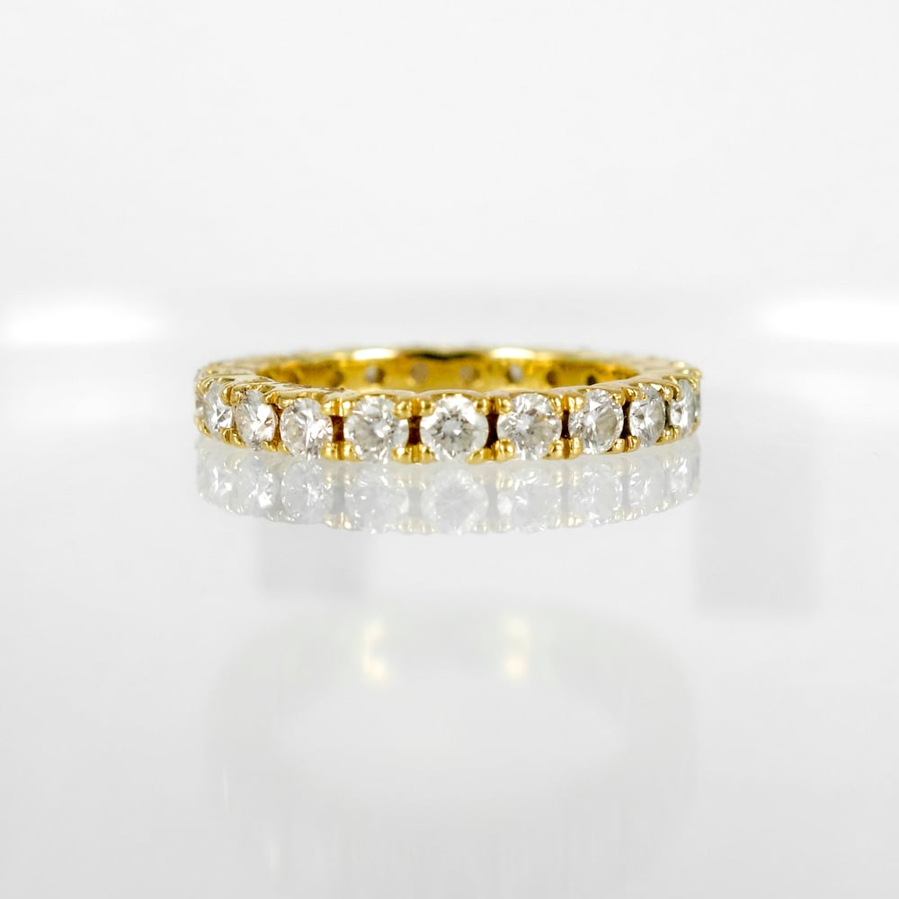 Image of 18ct yellow gold diamond wedding band. PJ5849