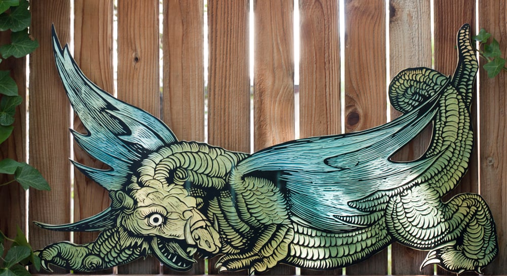 Image of Durer Dragon. Hand carved/painted Relief.