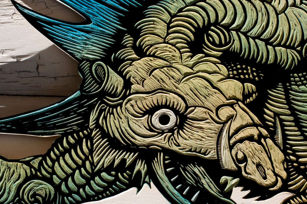 Image of Durer Dragon. Hand carved/painted Relief.