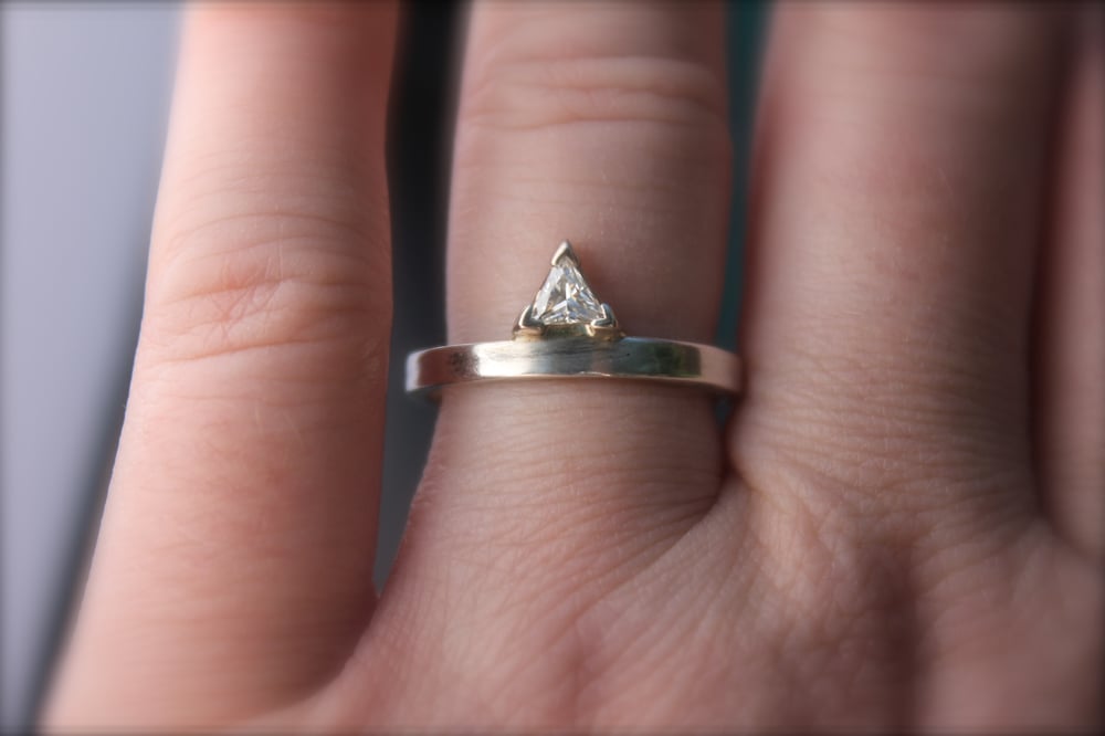Image of triangle moissanite rose gold engagement ring . R-1