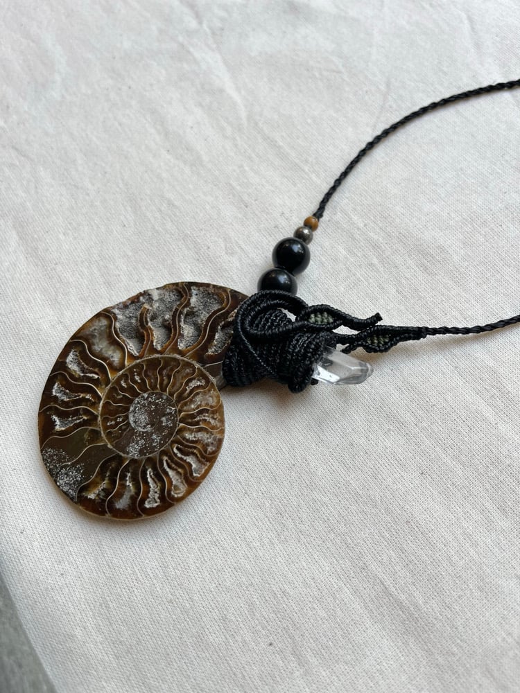 Image of Macrame necklace with ammonite and clear quartz 
